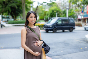 Canvas Print - Pregnant woman walk in the Taipei city