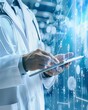 © Boontharika - Doctor using tablet with digital interface, representing advanced medical technology and healthcare innovations in modern medicine.
