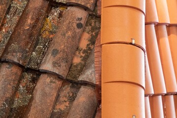 Wall Mural - Comparison tiles roof top before and after cleaning moss lichen high pressure water cleaner tile