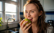 © Sun_Generative - A young woman in her 20s is eating an apple for a bright breakfast.
