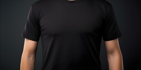 Soft black cotton crew neck tshirt on black background. Concept Clothing, T-Shirt, Fashion, Photography, Black Background