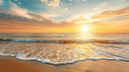 Beautiful golden sand beach with sunlight and wave in sunset time