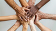 © Dmitriy - Diverse hands clasped together in a symbol of unity and support, poster