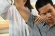 © Prathankarnpap - Physical therapist helping male patient doing stretching exercises, shoulder joint treatment