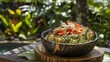 © GoodRNG - A bowl of Vanuatu lap lap with grated root vegetables and coconut milk, baked in banana leaves, served on a wooden platter, photographed in a tropical garden setting