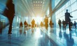 © Onchira - Long exposure shot of crowd of business people walking in bright office lobby fast moving with blurry