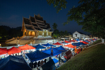 Top view of Luang Prabang night market with the Royal Palace in the back