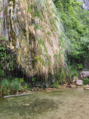 Canvas Print - Waterfall in the lake