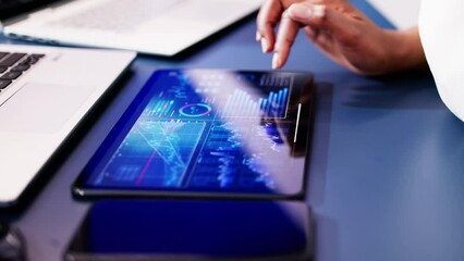 Poster - African American woman analyzing financial data on computer