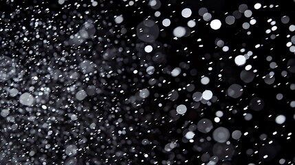 Wall Mural - Hundreds of white rain drops on a glass window with a black background