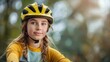 © Lens Legacy - A spirited young girl in a yellow bike helmet is seen in an outdoor environment, basking in the natural beauty and embodying the adventurous spirit of youth.