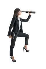 Canvas Print - A businesswoman using a telescope to look forward, concept of future planning, isolated on a white background