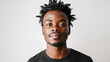 © Creator - an African American man with a confident expression, set against a plain white background, focusing on facial features and natural beauty.