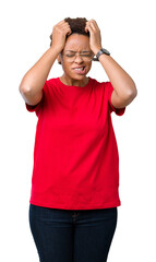 Sticker - Beautiful young african american woman wearing glasses over isolated background suffering from headache desperate and stressed because pain and migraine. Hands on head.