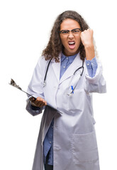 Sticker - Young hispanic doctor woman holding a clipboard annoyed and frustrated shouting with anger, crazy and yelling with raised hand, anger concept