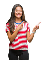 Poster - Young beautiful arab woman over isolated background smiling and looking at the camera pointing with two hands and fingers to the side.