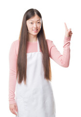 Sticker - Young Chinese shop owner woman over isolated background wearing white apron surprised with an idea or question pointing finger with happy face, number one