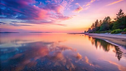Wall Mural - Dusk on the shore with soft, pink hues reflecting on the water , beach, ocean, sunset, twilight, horizon, coast, tranquil