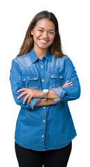 Poster - Young beautiful brunette woman wearing blue denim shirt over isolated background happy face smiling with crossed arms looking at the camera. Positive person.