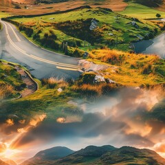 Wall Mural -   Aerial view of winding road in valley with mountains in background and clouds in foreground