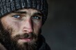 © Vlad - Attractive Man in Knit Beanie Hat. Face of a Photogenic Guy with Beard