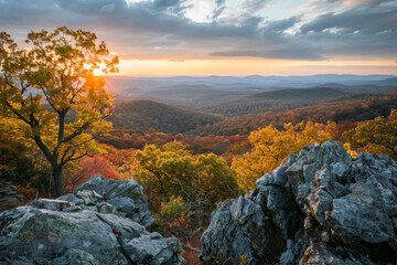 Wall Mural - Sunset view from Grayobbled Rock in the shenandoah national park, overlooking valley with colorful trees and distant mountains.