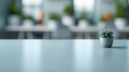 Aufkleber - Minimalist Office Design: Polished White Table with Plant and Blurred Background in Modern Engineering Environment