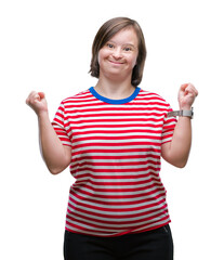 Poster - Young adult woman with down syndrome over isolated background excited for success with arms raised celebrating victory smiling. Winner concept.