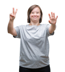 Sticker - Young adult woman with down syndrome over isolated background showing and pointing up with fingers number seven while smiling confident and happy.