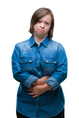 Sticker - Young adult woman with down syndrome over isolated background with hand on stomach because indigestion, painful illness feeling unwell. Ache concept.