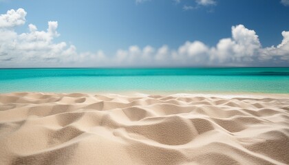 closeup of sandy beach with turquoise sea and sky background high quality photo