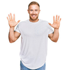 Wall Mural - Young irish man wearing casual clothes showing and pointing up with fingers number ten while smiling confident and happy.