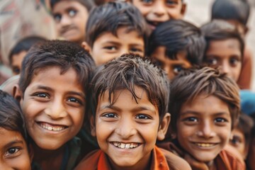 Wall Mural - Portrait of a group of indian kids smiling at the camera.