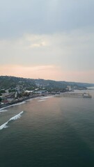 Wall Mural - La Libertad beach in El Salvador's surf city district aerial footage early in the morning.