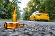 © melhak - Close-up of beer bottle on road surface near a car – impaired driving – alcohol safety campaign