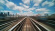 © Justlight - A blur of motion as the train zips through the viaduct leaving behind a trail of clouds in the sky.