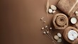 © TheWaterMeloonProjec - Spa themed flat lay on brown background with copy space