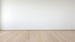 © halo - A photo of a large plain white wall with a light wood floor