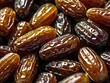 © Rafli - dates close up. date palm background. Date palm on a traditional craftsman market.Horizontal image.