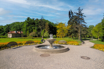 Gdansk, in the foreground a small fountain in Orunski Park, Poland