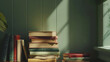 © VK Studio - A stack of books sits on a wooden surface bathed in natural light, creating a peaceful, scholarly ambiance in a softly lit room.