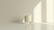 © 2rogan - White candle in clear glass on white backdrop mockup