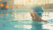 © VK Studio - Elderly woman in blue swim cap and goggles smiling joyfully in a swimming pool, enjoying her time.