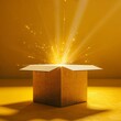 © Jullia - Mystical Golden Light Burst Emanating from Open Cardboard Box on Yellow Background