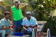 © ADDICTIVE STOCK - Summer business meeting with diverse team outdoors