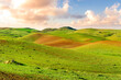 © Yaroslav - Countryside farm landscape of green field grassland in spring pr summer season with green fresh grass and beautiful sunset or sunrise cloudy sky on background