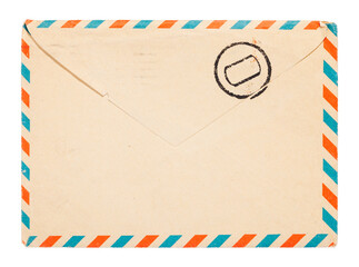 Old brown envelope with air mail mark and stamp isolated