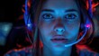 © vimp - Close-up portrait of a woman wearing a headset, lit by neon lights