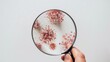 © AkuAku - Examining Hantavirus with a magnifying glass against a white backdrop