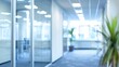© addymawy - Blurry View of a Modern Office Corridor